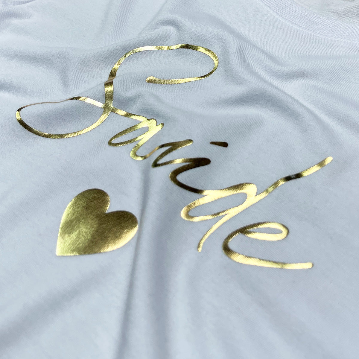 T-Shirt Infantil Branca Saúde Coração  Dourado