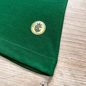 Camiseta Feminina Verde Jesus Nasceu Dourado