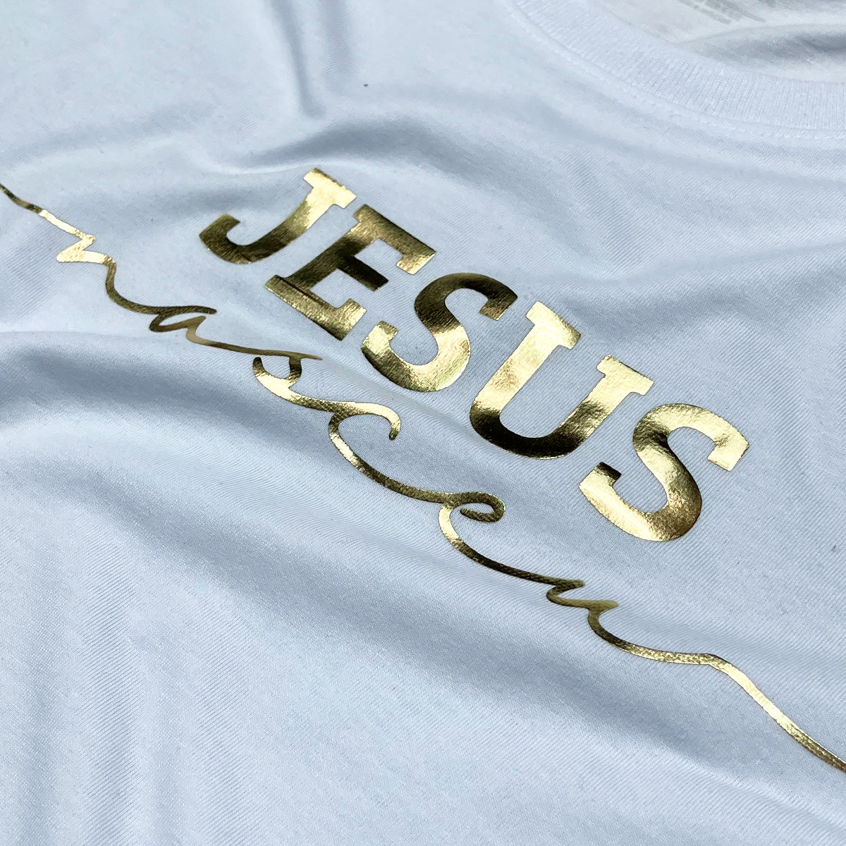 T-Shirt Infantil Branca Jesus Nasceu Dourado